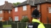 A policeman stands outside a residential property in south Manchester, Britain, May 24, 2017. 