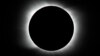 FILE - The moon covers the sun during a total solar eclipse as seen in Piedra del Aguila, Argentina, Dec. 14, 2020. 