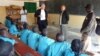 FILE - A Catholic primary school holds classes in Tchere, Cameroon, April 5, 2014. 