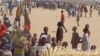 FILE - People who fled their homes due to violence from the Islamic extremists group Boko Haram are seen inside a refugee camp in Minawao, Cameroon, Feb. 25, 2015. Humanitarian challenges continue to mount in Cameroon, as refugees continue to flow in from Nigeria and the Central African Republic.