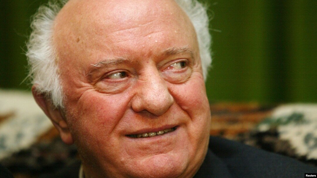 Former Georgian President Eduard Shevardnadze smiles during an interview with Reuters in his residence in Tbilisi, Nov. 24, 2003.