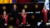 Venezuelan Supreme Court judges, from left, Fanny Marquez, Caryslia Rodriguez and Inocencio Figueroa stand during a ceremony after the court's audit of the disputed results of the presidential election, in Caracas, Aug. 22, 2024.