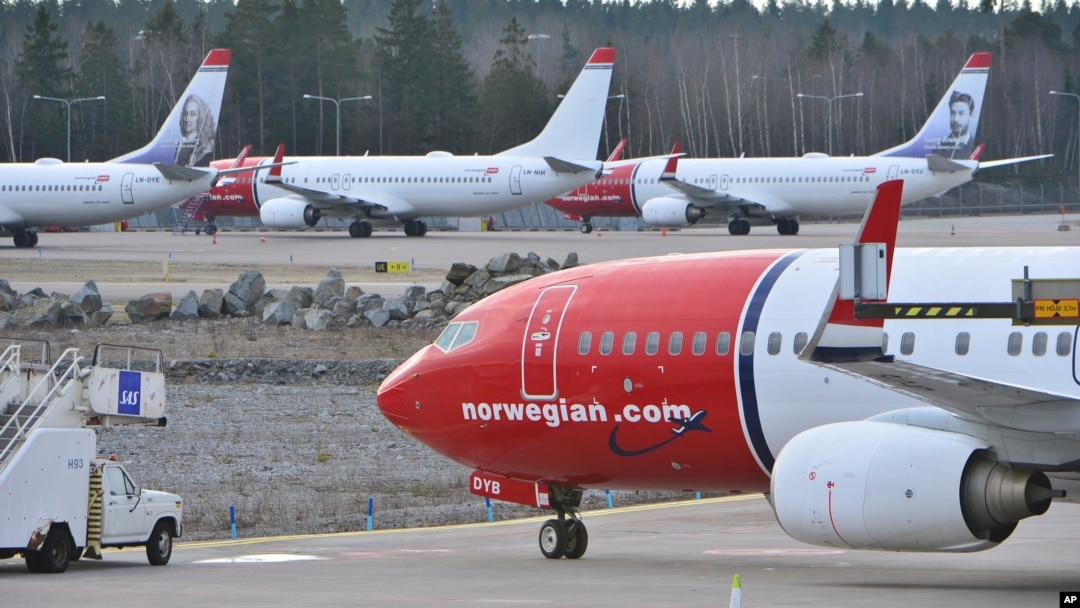 FILE - Boeing 737-800 aircraft belonging to budget carrier Norwegian are parked at Stockholm Arlanda Airport, March 5, 2015.