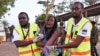Paramedics help a student who was injured during an attack by Somalia's al-Qaida-linked al-Shabab gunmen at Garissa University College, Kenya, April 2, 2015. 