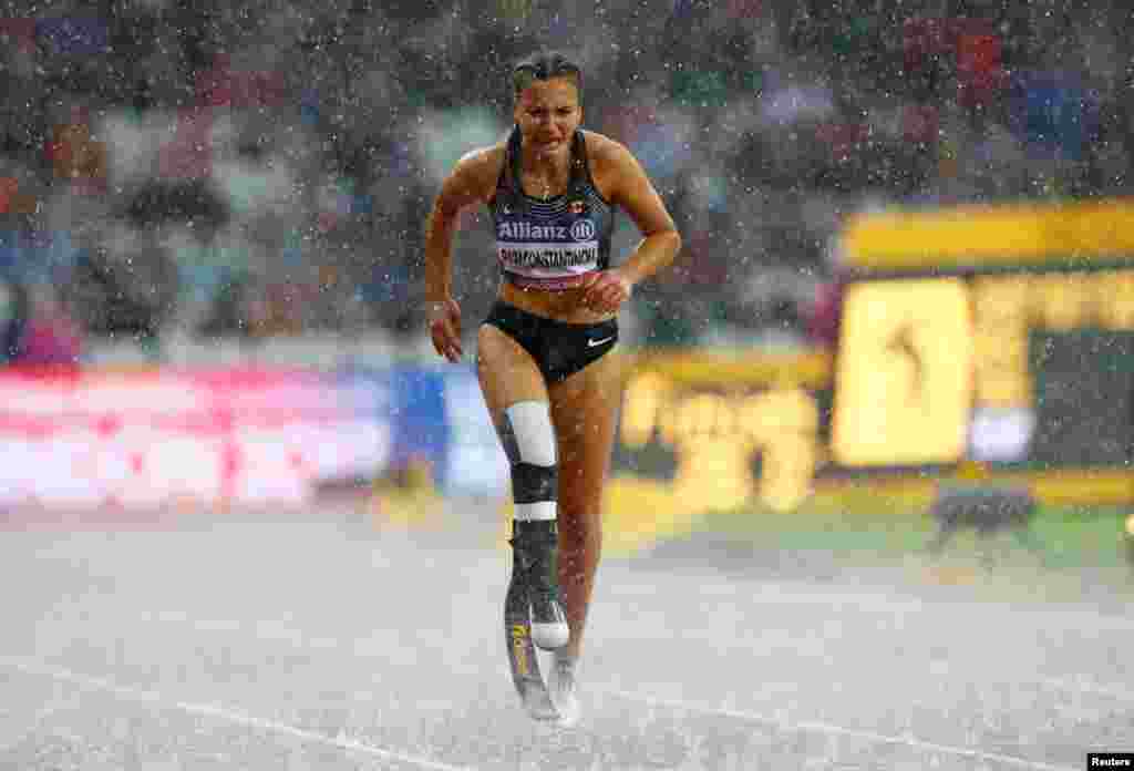 Canada's Marissa Papaconstantinou makes her way to the finish line after falling in the Women's 200m T44 Final of IAAF World ParaAthletics Championships.