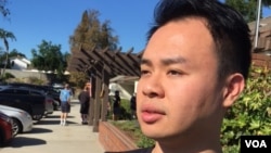 Poll watcher Eddie Hu of the citizen group Asian Americans Advancing Justice — Los Angeles says the election is going smoothly at the polling station in the San Gabriel Valley, an area near Los Angeles with a large Asian American population. (M. O'Sullivan/VOA)