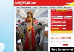 FILE - This undated screenshot from a VietJet flight captures a bikini show on board one of its airplanes.
