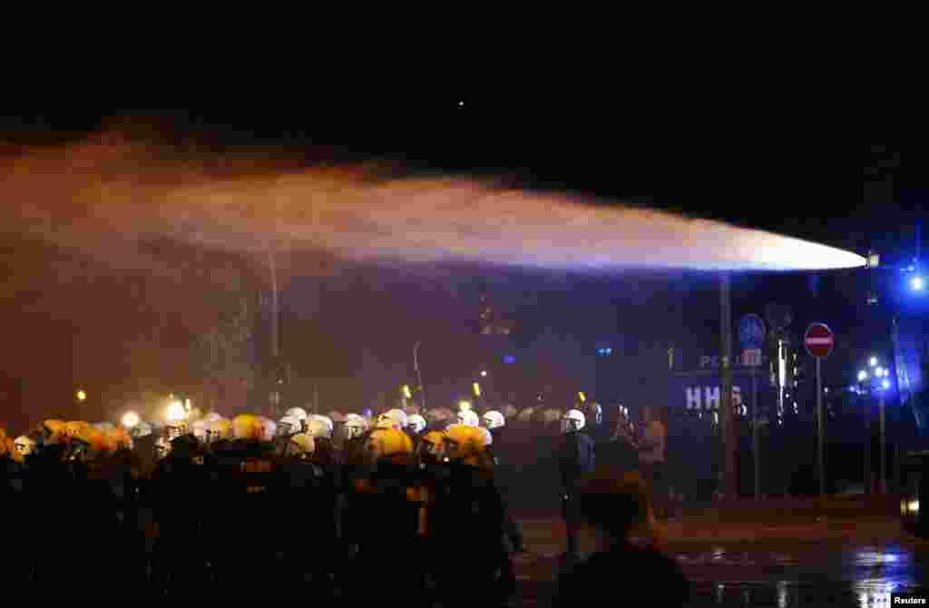 Police uses a water cannon during a protest at Schanzenviertel ahead the G20 summit in Hamburg, Germany, July 4, 2017.