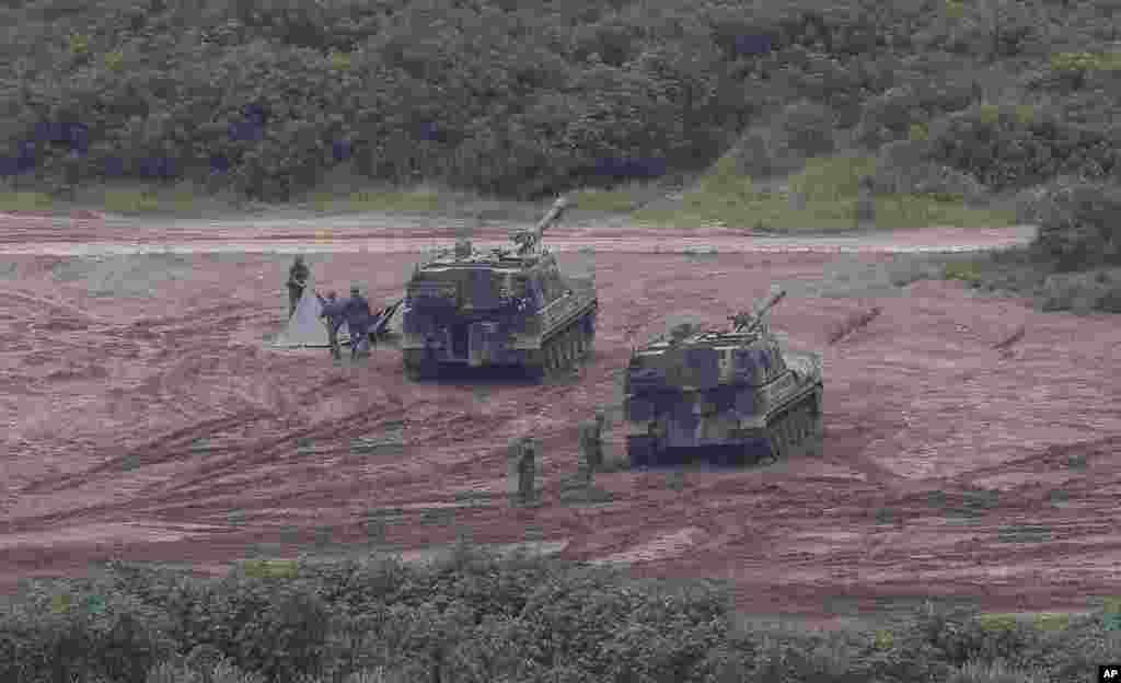 South Korean army soldiers prepare their military exercise in Paju, South Korea, near the border with North Korea.