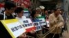 支聯會中聯辦抗議街頭劇(香港鄒幸彤推特圖片)