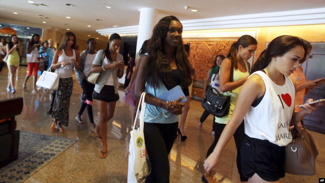 Miss World pageant contestants leave Bali International Convention Center after a rehearsal in Nusa Dua, Bali, Indonesia on September 16, 2013. 