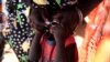 A displaced South Sudanese child receives an oral cholera vaccine in a camp for internally displaced people in the United Nations Mission in South Sudan (UNMISS) compound in Tomping, Juba February 28, 2014