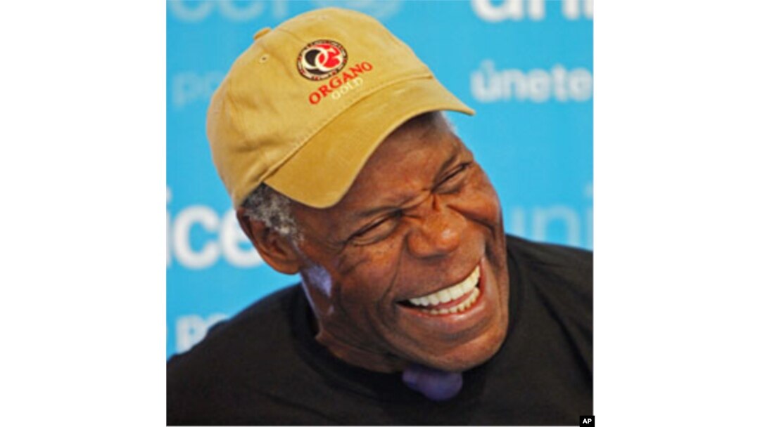 UNICEF Ambassador and actor Danny Glover laughs during an event in Lima October 20, 2010 (file photo)