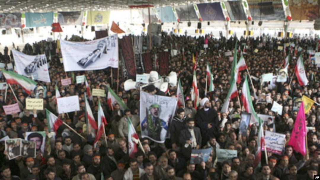 People take part in the funeral of Sanee Zhaleh, a student who was shot dead during an opposition rally in Tehran, February 16, 2011