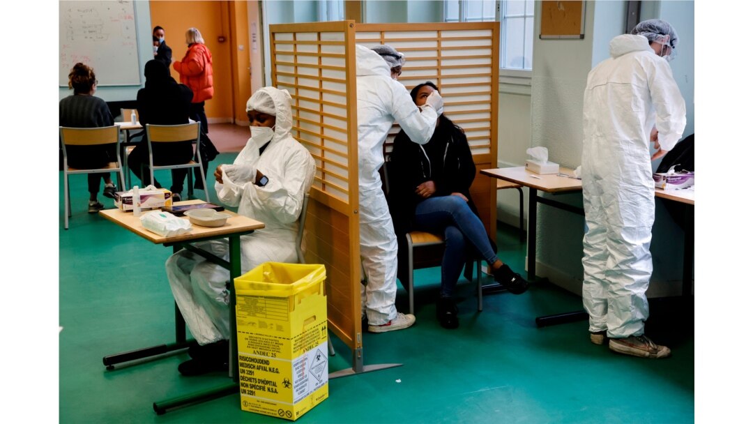 A student of the Emile Dubois high school takes part in a COVID-19 antigen test in Paris, France Nov. 23, 2020.