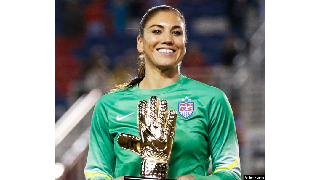 United States' goalkeeper Hope Solo (1) poses with the golden glove award after the SheBelieves Cup, March 9, 2016, in Boca Raton, Florida.