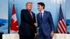President Donald Trump, left, meets with Canadian Prime Minister Justin Trudeau during the G-7 summit, June 8, 2018, in Charlevoix, Canada.