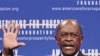Republican presidential candidate Herman Cain speaks at the Defending the American Dream Summit in Washington, November 4, 2011.