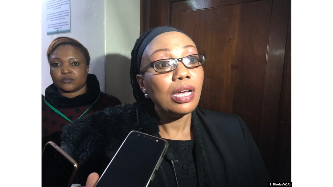 FILE - Priscilla Chigumba, the chairperson of Zimbabwe Election Commission, speaks to reporters in Harare, June 14, 2018.