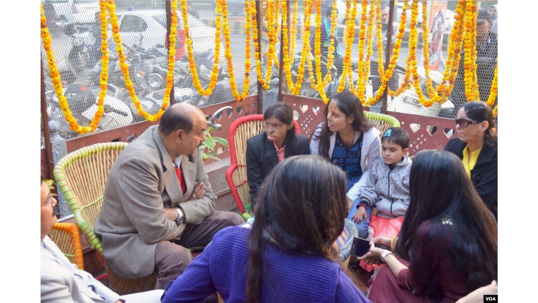 Acid attack survivors, friends and well wishers gather for the anniversary celebrations of the Sheroes Hangout cafe. (A. Pasricha for VOA)