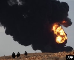 Qaddafiy g’arb hujumiga urush bilan javob qaytarishga tayyor