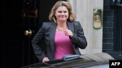 British politician Justine Greening leaves No. 10 Downing Street in central London on Sept. 4, 2012.