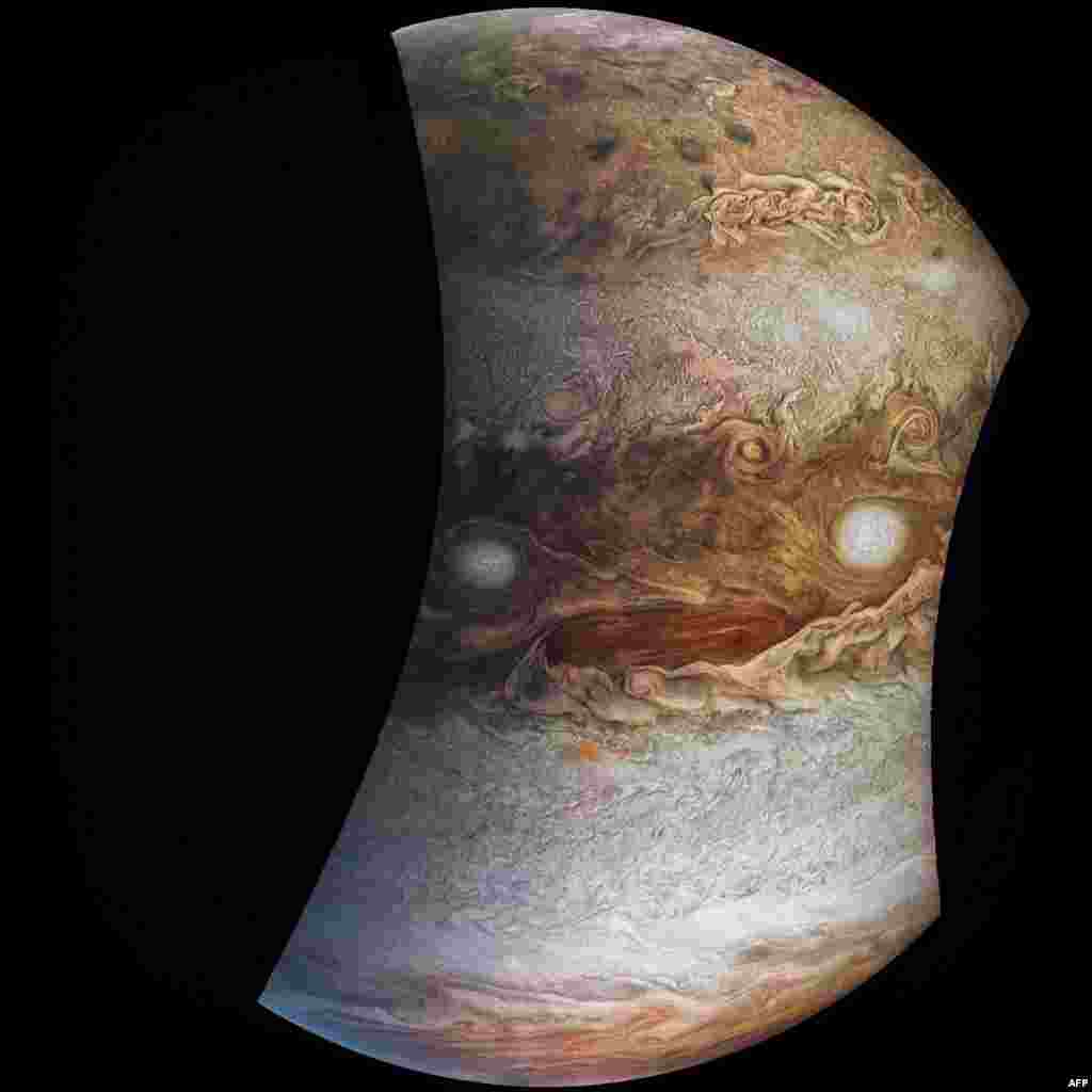 This NASA handout image released Friday shows an image acquired by JunoCam on NASA’s Juno spacecraft, May 19, 2017, at 11:20 am PT (2:20 p.m. ET) from an altitude of 12,075 miles (19,433 kilometers). (NASA handout)