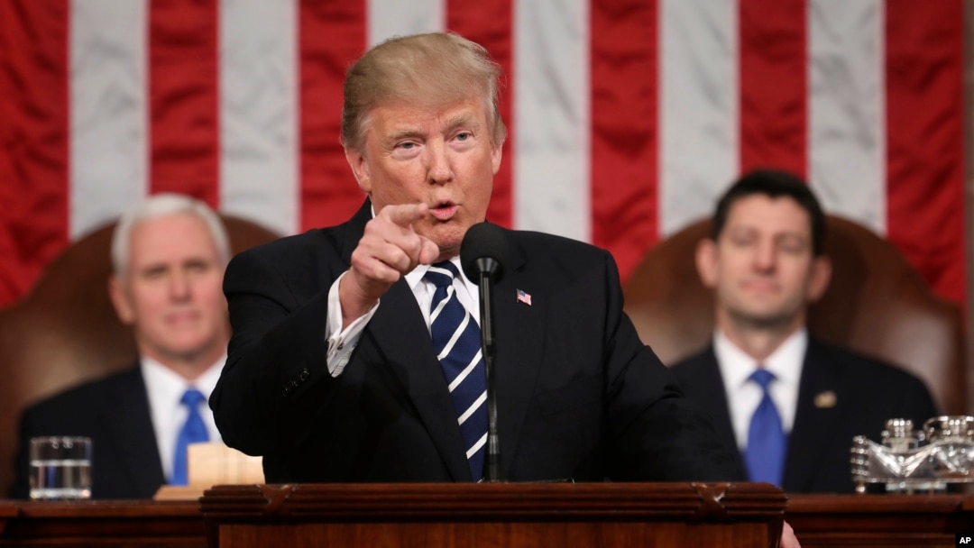 President Donald Trump addresses a joint session of Congress on Capitol Hill in Washington, Feb. 28, 2017. Vice President Mike Pence and House Speaker Paul Ryan of Wisconsin listen.