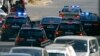 A convoy believed to be transporting South Africa's President Jacob Zuma leaves the Pretoria hospital where former President Nelson Mandela is being treated, June 27, 2013. 