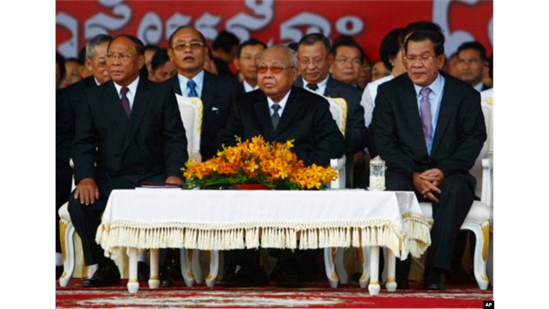 From left: Cambodian National Assembly President Heng Samrin, Senate President Chea Sim, Prime Minister Hun Sen, attend ceremony, Phnom Penh, Jan. 7, 2014.
