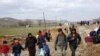 Displaced families approach Manbij, Syria, Feb.21, 2020. (Heather Murdock/VOA)