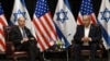 ARCHIVO - El presidente Joe Biden, a la izquierda, con el primer ministro de Israel, Benjamin Netanyahu, mientras se une a una reunión del gabinete de guerra israelí en Tel Aviv el 18 de octubre de 2023.