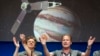Scott Bolton, left, and Rick Nybakken are seen in a post-orbit insertion briefing at NASA's Jet Propulsion Laboratory following the solar-powered Juno spacecraft entered orbit around Jupiter on July 4, 2016, in Pasadena, Calif. 