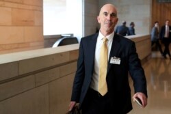 FILE - State Department Inspector General Steve Linick departs after briefing House and Senate Intelligence committees at the U.S. Capitol in Washington, Oct. 2, 2019.