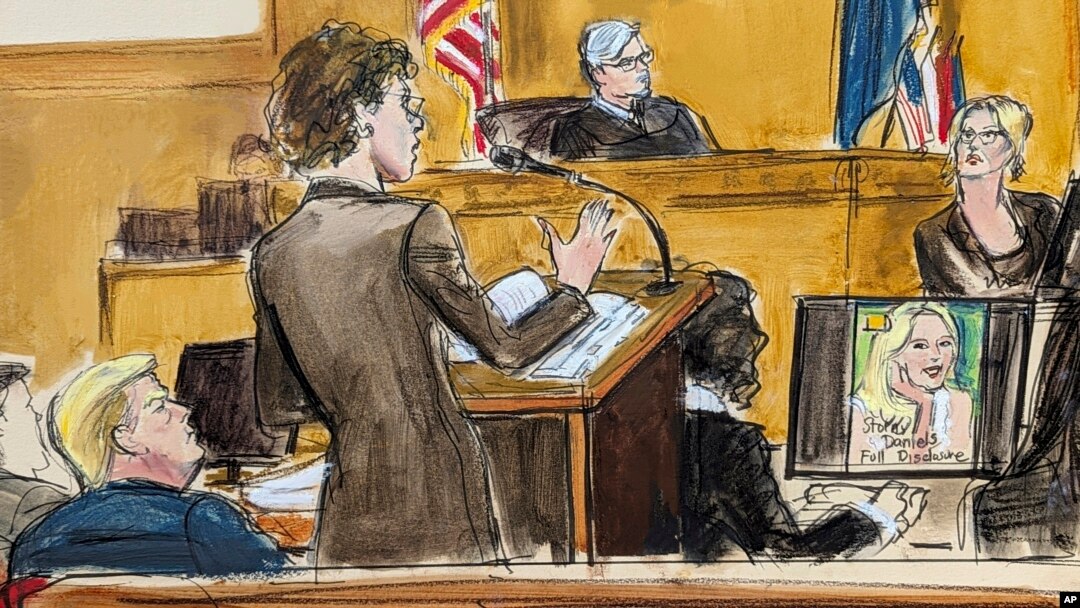 In this courtroom sketch, defense attorney Susan Necheles, center, cross-examines Stormy Daniels, far right, as former President Donald Trump, left, looks on with Judge Juan Merchan presiding during Trump's trial in New York City, May 7, 2024.