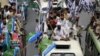 Supporters of the Defense of Pakistan Council take part in a rally against the reopening of NATO supply lines in Lahore, Pakistan, July 8, 201
