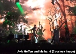 Exiled Iranian rock musician Shahin Najafi, right, sang alongside Israeli rock star Aviv Geffen, left, at a concert in Tel Aviv -- the first performance by an Iranian artist at an Israeli rock concert -- on March 2, 2017.