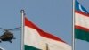 A military helicopter flies over flags of countries attending the Shanghai Cooperation Organisation summit in Bishkek August 15, 2007. The summit of Shanghai Cooperation Organisation, which groups China, Russia, Kazakhstan, Kyrgyzstan, Tajikistan and Uzbe