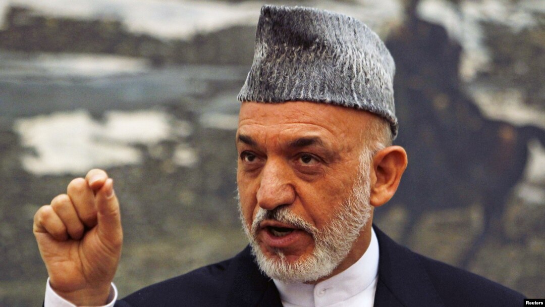 Afghan President Hamid Karzai speaks during a news conference in Kabul, June 12, 2012. 