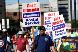 Michigan: Pochta xizmati xodimlari manfaati uchun namoyish