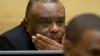 Former Congo vice-president Jean-Pierre Bemba looks up at his trial at the International Criminal Court in The Hague, Netherlands, Sept. 29, 2015.