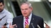 FILE - Democratic Sen. Bob Menendez speaks with the media on Capitol Hill in Washington, March 5, 2019.