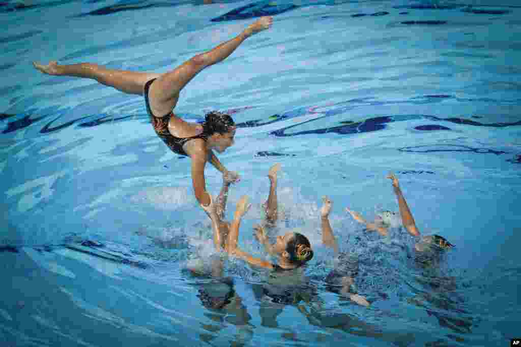 Team Malaysia competes during Team Free Routine Synchronized Swimming final of the 29th South East Asian Games in Kuala Lumpur, Malaysia.