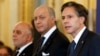 From left, Iraqi Prime Minister Haider al-Abadi, French Foreign Minister Laurent Fabius and U.S. Deputy Secretary of State Antony Blinken talk to reporters after a meeting of anti-Islamic State coalition members in Paris, June 2, 2015.
