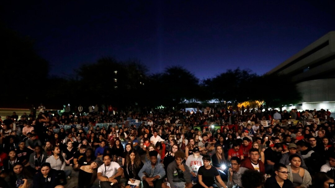 Students from University of Nevada Las Vegas hold a vigil Oct. 2, 2017, in Las Vegas. 