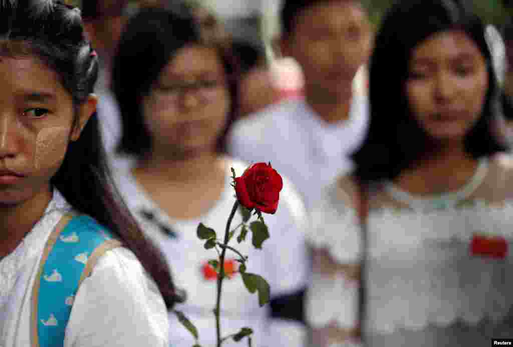 Students attend a protest, to mark the 55rd anniversary of the military's suppression of student protests in 1962, at Yangon University, Yangon, Myanmar.