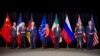 Secretary Kerry poses for a group photo with fellow EU, P5+1 foreign ministers and Iranian Foreign Minister Zarif after reaching Iran nuclear deal, in Vienna, Austria, July 14, 2015.