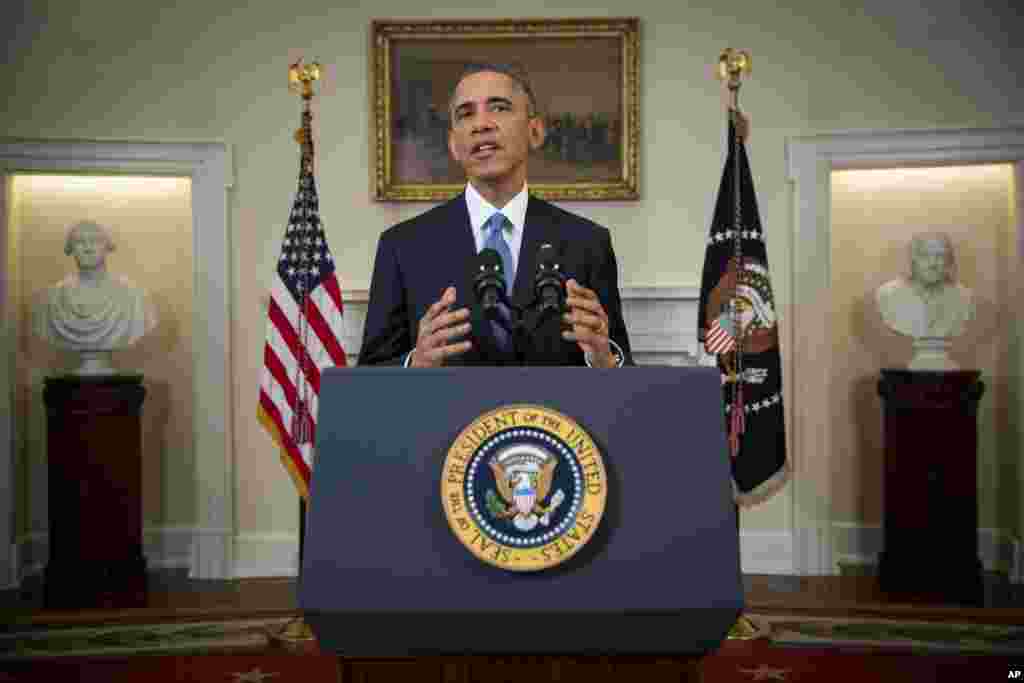 Prezident Barak Obama Kuba bilan aloqalar tiklangani haqida e'lon qilmoqda. Oq uy, 17-dekabr, 2014-yil.