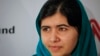FILE - Pakistan's Malala Yousafzai poses during a photo opportunity before speaking at an event in New York, Oct.10, 2013.