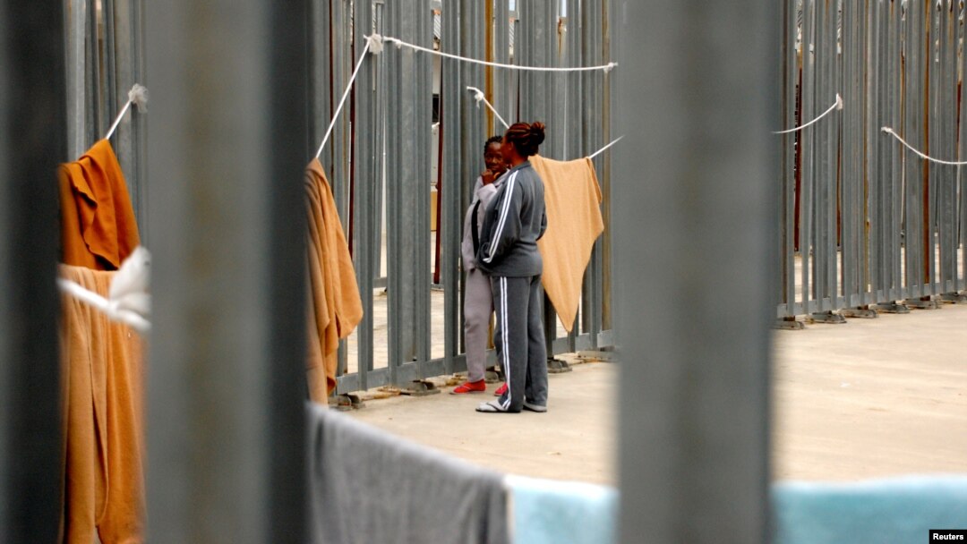 Women are seen as they are held in the Ponte Galeria detention center for migrants near Rome, May 6, 2017. 